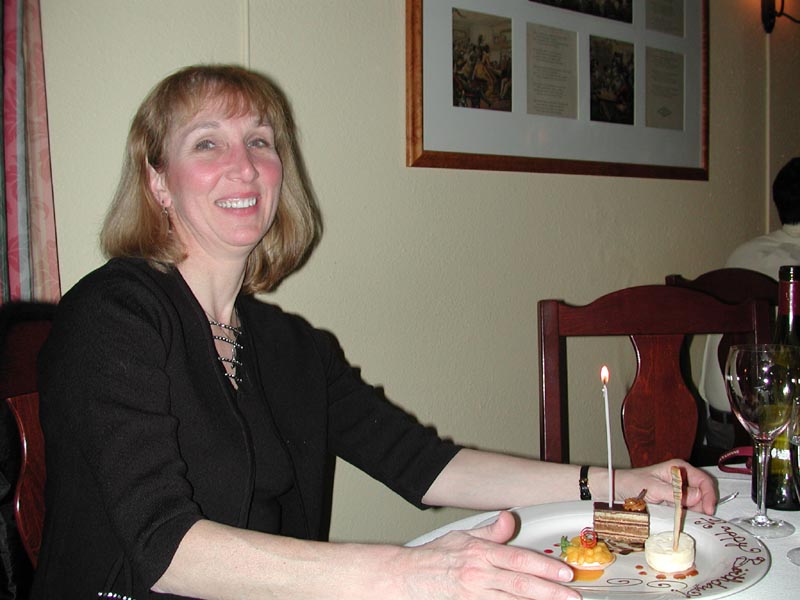 Carol with birthday candle.jpg 68.7K